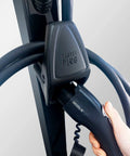 Badass Heavy Duty EV Charger Holster With Integrated Cable Management For J1772 Plug Station holding a Grizzle plug.