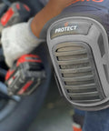 Person wearing Gel Knee Pads For Work Heavy Duty Anti Slip Knee Protection For Construction Tiling Flooring Roofing And Gardening