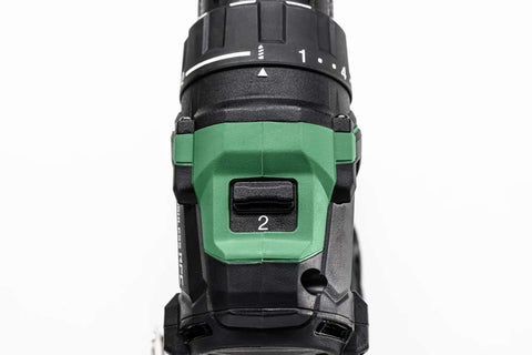 Close-up of Kickass 36V Brushless Cordless Drill controls showing torque settings for wood, steel, and aluminum use.