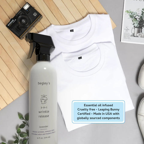 Straight Up Game Changer Travel Size Wrinkle Remover And Static Cling Eliminator With Fresh Linen Scent Quick Fix Odor Killer For Shirts And Pants Two Pack on a wooden surface with white shirts and camera.