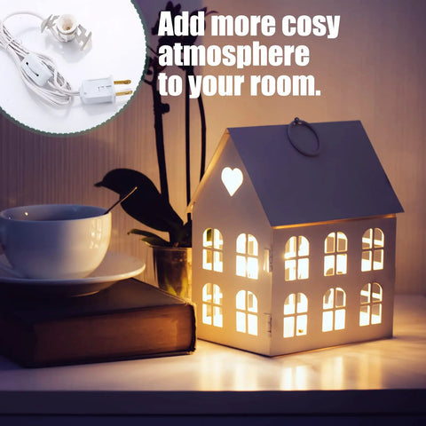 Lit 24 Pack LED Light Bulb Cords Kit with Switch 6 Ft Warm White Wire used in decorative house lamp display in cozy room.