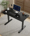 Rock Solid 55 Inch Electric Standing Desk With Double Beam Frame For Home Office Or Gaming Setup with black finish and ergonomic workspace.
