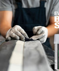 Person applying Metal Reinforced Filler For Aluminum And Galvanized Steel Repairs To Stop Rust And Fill Holes, 13 Fl Oz