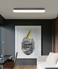 Dimmable LED Ceiling Light With Remote Control 37.4 Inch Flush Mount Low Profile Modern Wood Grey Finish 36W 3000K to 6000K Color Temperature Ideal For Living Room Bedroom Hallway And Office Lighting installed on ceiling above a modern office space.