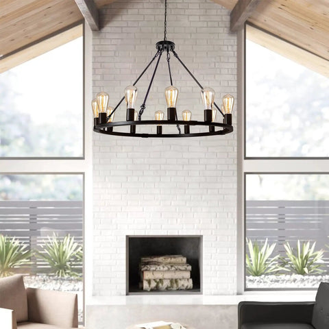 12 Light Black Wagon Wheel Chandelier For Dining Rooms And Kitchen Islands Dimmable Cozy Rustic Farmhouse Pendant Lighting With 12 E26 Sockets Ideal For High Ceilings Foyer Living Room And Porch hanging in a modern living room.