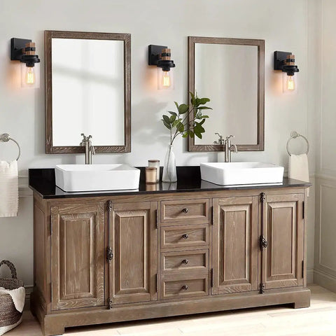 Two Light Rustic Black Vanity Light For Bathroom Over Mirror With Clear Glass Shades, shown in a modern bathroom setting.