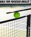 All In One Portable Pickleball And Tennis Practice Net System No Tools Easy Setup In Minutes Freestanding 10ft Net For Driveway Backyard Indoor Outdoor Use Includes Carry Bag with paddle and ball in use