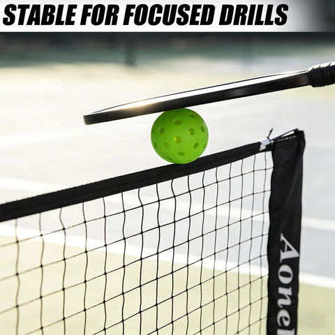 All In One Portable Pickleball And Tennis Practice Net System No Tools Easy Setup In Minutes Freestanding 10ft Net For Driveway Backyard Indoor Outdoor Use Includes Carry Bag with paddle and ball in use