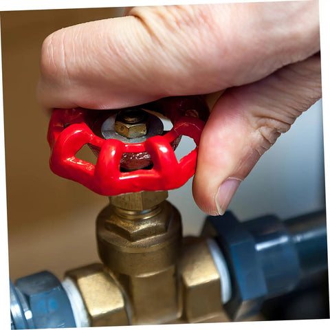 Close-up of hand turning red cast iron valve from Decorative Cast Iron Valve Hand Wheel Set 10 Pcs Smooth Finish Precision Made For Water Fittings And Plumbing Parts Beefy Pro Grade Durable Metal Valve Handle Easy Open Close.