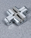 Close-up of Concealed Cross Hinges Two Pack Stainless Steel For Folding Doors And Wooden Cabinets Hidden Design Heavy Duty Mount
