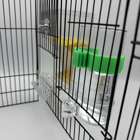 Heavy Duty Automatic Bird Feeder And Water Dispenser Cage Combo showing clear water dispenser attached to wire cage.