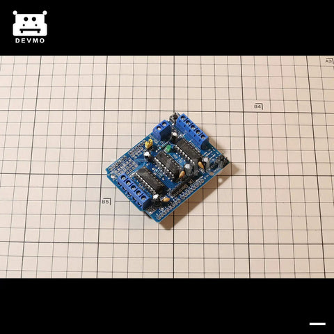 Arduino Compatible L293D Motor Driver Shield For Uno R3 Mega Duemilanove, four-channel motor shield on grid background