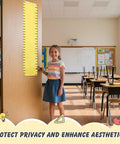 Child standing in classroom next to a door with a yellow ruler chart, promoting privacy and aesthetics for educational spaces.