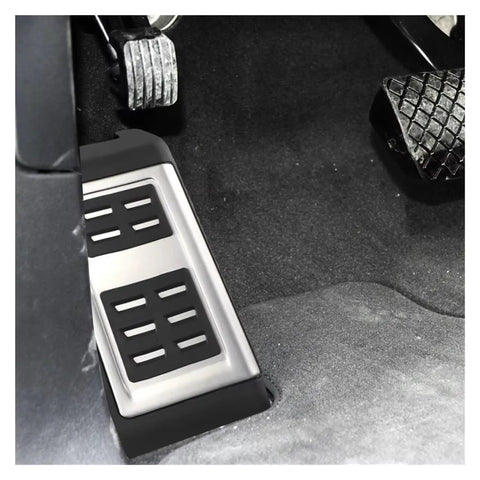 Knockout Clutch Pedal Pads For Vw Touareg 2007 To 2018 showing rubber dead pedal cover with integrated footrest in a car interior.