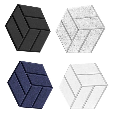 Four hexagonal acoustic foam tiles in black, white, navy, and gray for soundproofing, part of 12 Pack Hexagonal Acoustic Wall Panels.