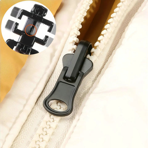 Close-up of black slider from Zipper Repair Kit Six Piece Set With Three Slider Sizes 3 5 And 8 And Double Sided Sliders