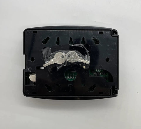 Back view of Rock Solid Compact Remote Fire Annunciator with keys for access, designed for fire alarm control panels.