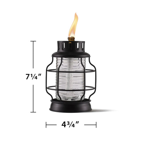 Tabletop Metal Torch Lanterns Two Pack for Outdoor Patio Garden and Backyard, glass with black metal cage, lit flame