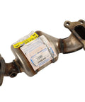 Close-up of GM Genuine Parts Three Way Catalytic Converter Kit With Exhaust Pipe Direct Replacement For Cars And Trucks Engineered To OE Specs For A No Fuss Fit And Emissions Compliance