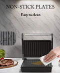 Multi Purpose Compact Contact Grill Sandwich Maker Panini Press With Floating Hinge Non Stick Plates shown being cleaned.