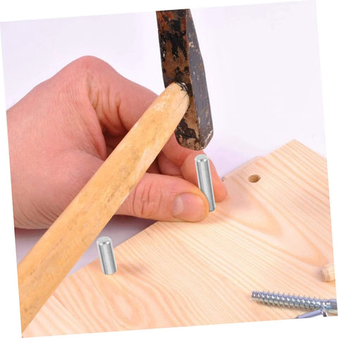 Installing stainless steel dowel pin into wood with hammer, part of Stainless Steel Dowel Pins 100 Pcs Pro Grade Precision Fastening Pegs