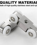 Front view of two piece four wheel stainless steel sliding door hanging wheel set with nylon wheel 23mm diameter.