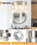 Three Light Brushed Nickel Bathroom Vanity Light Fixtures With Clear Glass Shades over mirror with details of mounting components