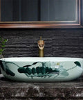 Super Chic Oval Above Counter Bathroom Vanity Vessel Sink Premium Porcelain Ceramic Washbasin with floral design on a countertop.