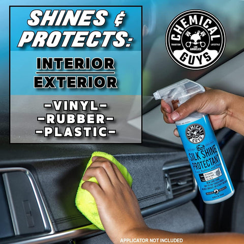 Person using Chemical Guys Silk Shine Protectant on car dashboard with green microfiber cloth, bottle in hand