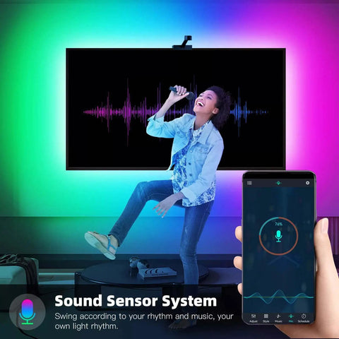Person enjoying Vivid RGB IC LED Strip Lights With App And Remote Control USB Powered Waterproof Tape Light TV Backlight