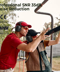 Two people wearing Noise Cancelling Ear Muffs For Adults And Kids With 35dB Hearing Protection while shooting outdoors.