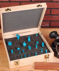 Large Router Bit Case For One Quarter And One Half Inch Bits With High Density Foam showing multiple blue router bits inside.
