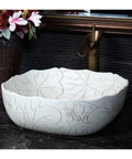 Square Above Counter Bathroom Sink In White Porcelain With Hand Carved Lotus Pattern Grit Proof Surface Easy Peasy Cleaning And A Dope Vintage Vibe That Hits Different On Your Next Vanity Setup.