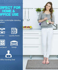 Woman standing on No Slip 0.875 Inch Thick Anti Fatigue Kitchen Floor Mat, Ergonomic Comfort Standing Mat, in a kitchen environment.