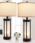 Set Of 2 Modern Table Lamps With USB Ports And Nightlight, Black Finish And White Frosted Glass, shown with shaded lights on.