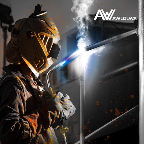 Welder using AR MC CGA200 Acetylene Regulator For MC Tanks With B Type Connection in action with bright sparks.