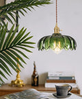 Chic Green Glass Plug In Pendant Light Fixture For Kitchen Island And Dining Room, Smooth Plug And Play Design, E26 Base Ready, Serious Home Refresh Glow Up No Bulb Included. Green glass pendant with leafy design over table.