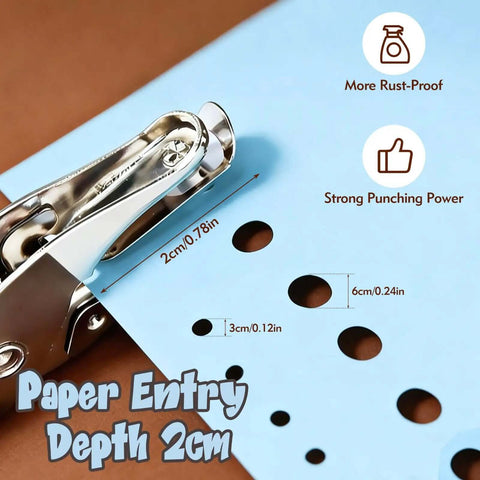 Adjustable Handheld Circle Hole Punch For Crafts And Scrapbooks With Blue Soft Grip One Quarter Inch And One Eighth Inch Heads Easy To Use For Tags Tickets Home Office And Classroom Projects Durable Metal Construction shown punching holes in blue paper with measurement indicators.
