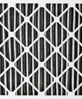 Close-up of 20x20x1 Furnace Air Filter MERV 12 Pleated With Carbon Odor Control For Home HVAC. Detail of pleated carbon layer.