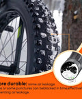 Close-up of 2 Pack Self Sealing Fat Bike Inner Tubes For 20x2.5 To 3.0 Tires With 32mm Schrader Valve on a bike, showing sealant action.