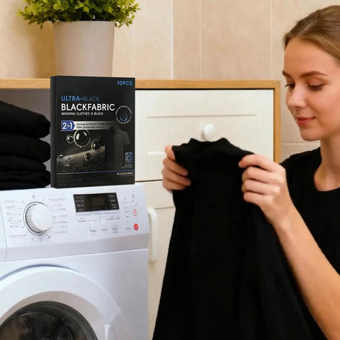 Person using Black Fabric Dye Sheets 10 Pack That Restores Faded Clothes To Rich Black In Every Wash next to washing machine