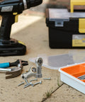 4Pc Garage Ready Threaded Rod End Bearings Equipped With Female Fish Eye Ball Joint Interface For Ironclad Industrial Power Transmission and Mechanical Linkage Systems on a workbench.