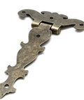 Antique bronze T-strap hinge close-up, part of 4 Pack T Strap Hinges Antique Bronze Decorative Door Hinges For Barn Doors, 115 x 70 mm.