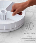 Hand adjusting dividers on Under Sink Turntable Organizer With Adjustable Dividers, Lazy Susan for kitchen or bathroom storage