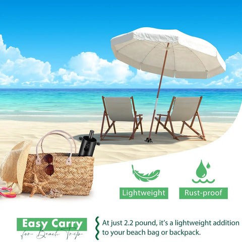 Beautiful beach scene with heavy duty beach umbrella sand anchor and metal stand securing umbrella, showcasing rust-proof and lightweight features.