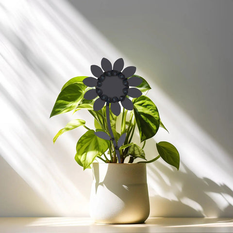 DIY Flower Welding Kit for Metal Art: 16 Gauge Stainless Steel Practice Weld Set in potted plant, 12 inch steel flower visible
