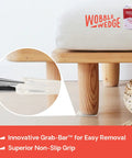 Flexible Plastic Leveling Shims under bed leg demonstrating stabilization and easy removal.