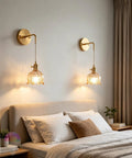 GZZBMY Indoor RGB Wall Light with Remote Control Dimmable Wall Lamp USB Rechargeable Creative Glass Lampshade Wall Sconce Creative Flowers Design for Bedroom Living Room (Amber,2 Packs) mounted on bedroom wall.