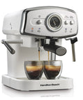 Kickstart Your Morning Grind With This Retro White Espresso Machine highlighting a patent slide and lock portafilter, brewing two espresso shots.