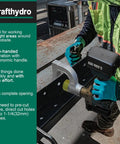 Worker using Hydraulic Hole Puncher Kit For Sheet Metal One Half Inch To One And A Quarter Inch Knockout Handles on steel beam